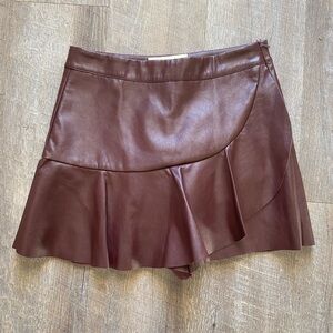 Burgundy faux leather mini skirt with ruffle detail #fauxleather